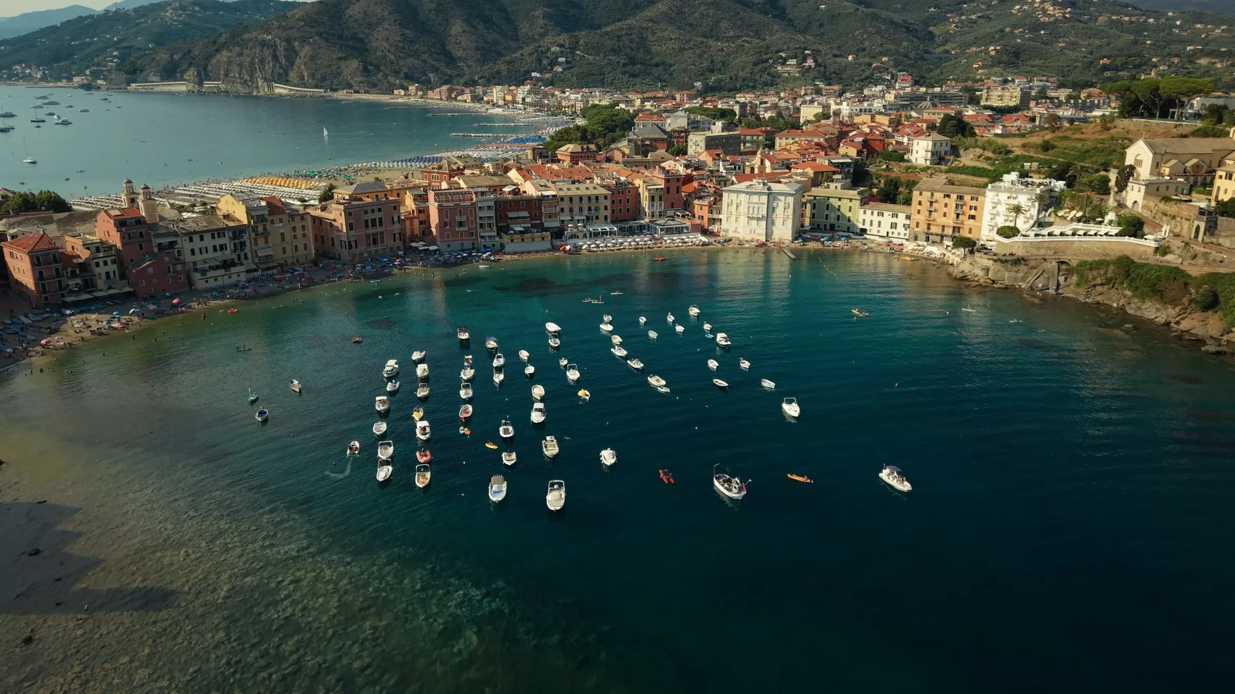 Drone view of boats in the Baia del Silenzio, Sestri Levante, Liguria
